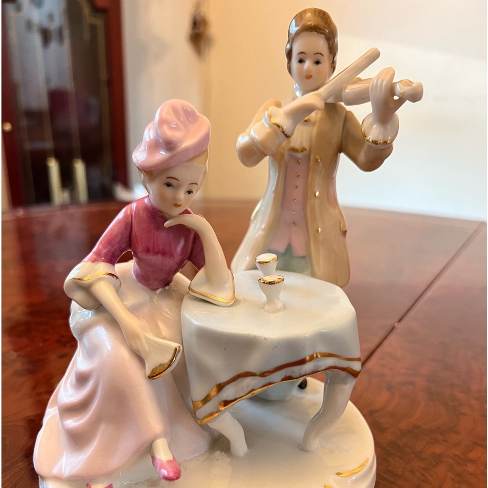 **For Sale: Elegant Statuette of Lady and Violinist**
